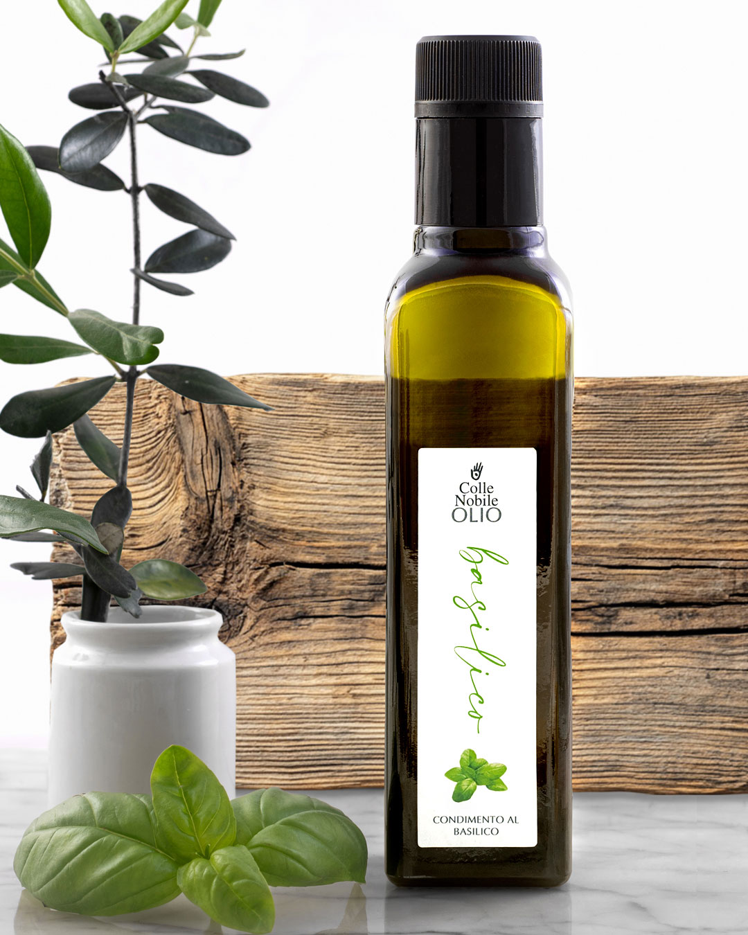 Stefania Cola's still life photograph of a bottle of basil oil